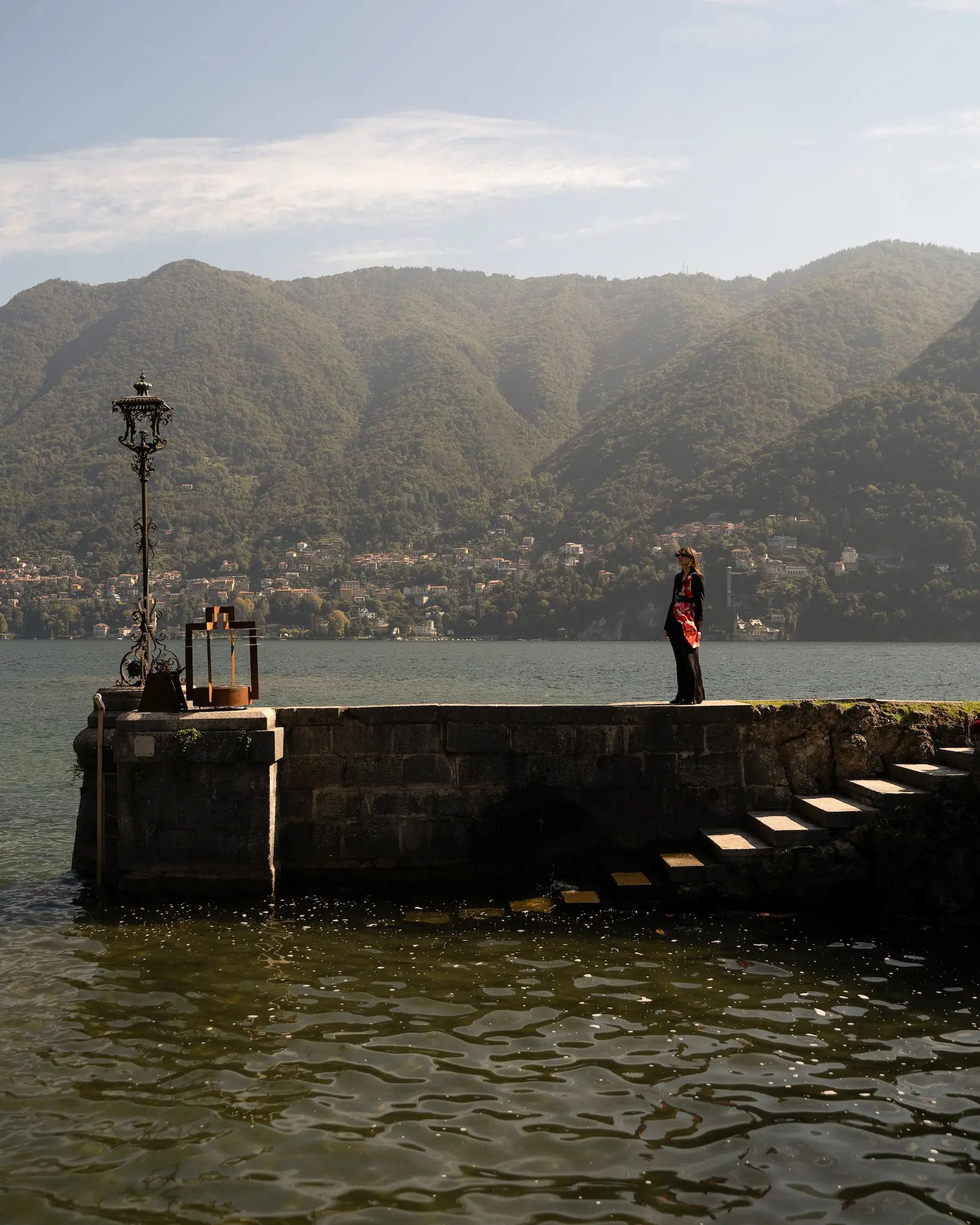 A woman admiring the beauty of Como's lake